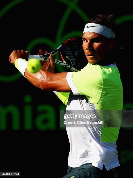 Rafael Nadal of Spain plays a backhand to Fernando Verdasco of Spain in their third round match during the Miami Open Presented by Itau at Crandon...