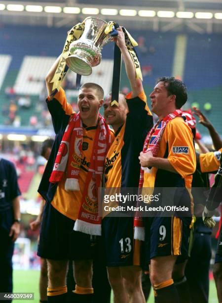 May 2001 - FA Cup Final - Arsenal v Liverpool - Steven Gerrard, Danny Murphy and Robbie Fowler of Liverpool celebrate with the FA Cup Trophy, at the...