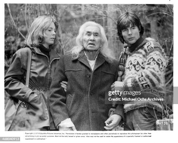 Actress Marilyn Hassett, actors Chief Dan George and Jan-Michael Vincent on set of the movie "Shadow of the Hawk", circa 1976.