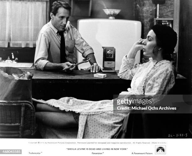 Actress Jeannie Berlin and Roy Scheider on set of the movie "Sheila Levine Is Dead and Living in New York" , circa 1975.