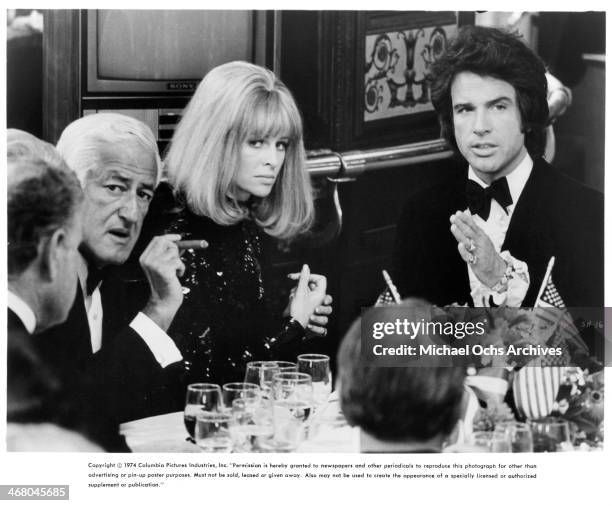 Actress Julie Christie and actor Warren Beatty on set of the movie "Shampoo" , circa 1975.