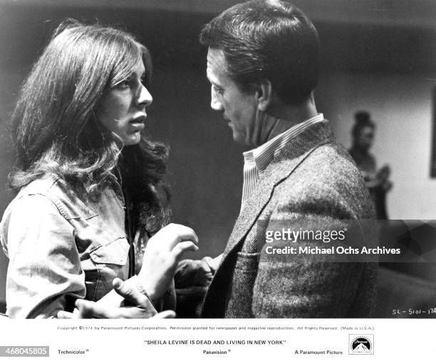 Actress Jeannie Berlin and actor Roy Scheider on set of the movie "Sheila Levine Is Dead and Living in New York" , circa 1975.