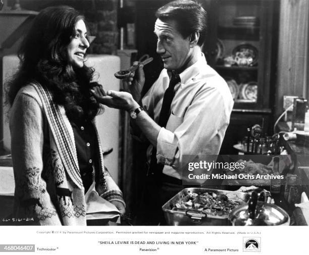 Actress Jeannie Berlin and actor Roy Scheider on set of the movie "Sheila Levine Is Dead and Living in New York" , circa 1975.