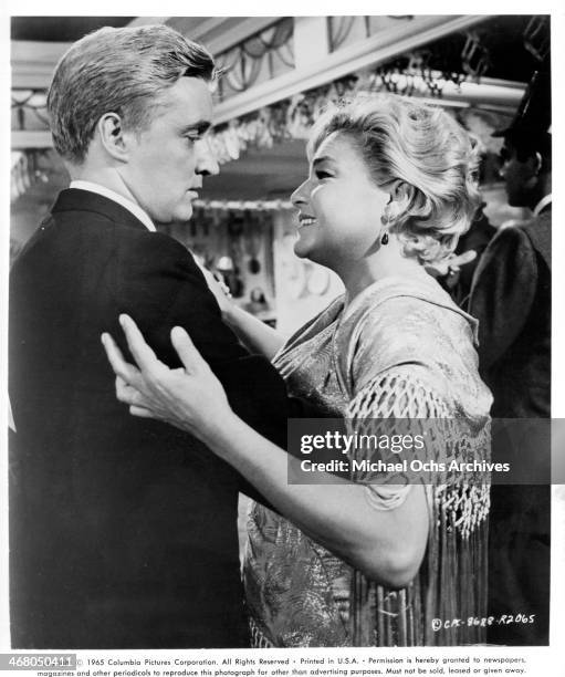 Actor Oskar Werner and actress Simone Signoret on set of the movie "Ship of Fools " , circa 1965.