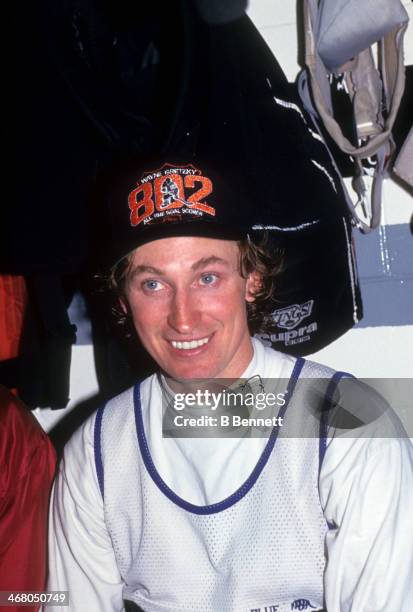 Wayne Gretzky of the Los Angeles Kings poses in the locker room after he scored his 802nd career goal in the game against the Vancouver Canucks on...