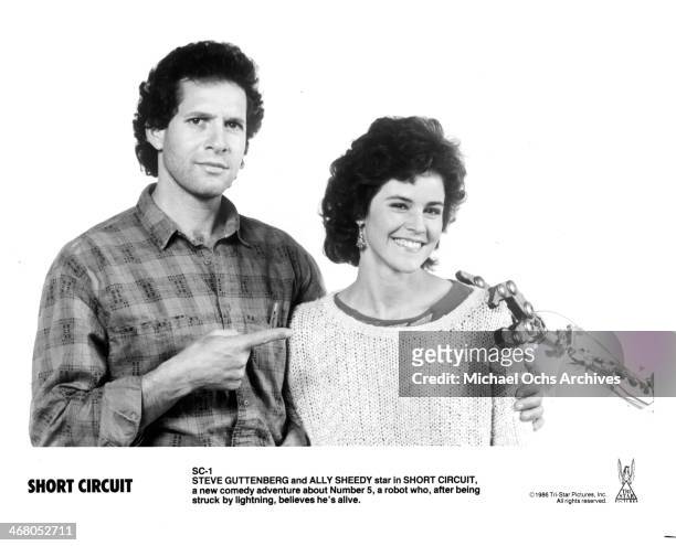 Actor Steve Guttenberg and actress Ally Sheedy pose for the movie "Short Circuit " , circa 1986.