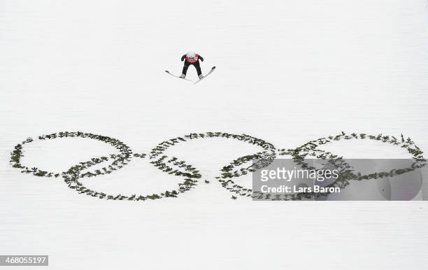 Sara Takanashi of Japan jumps during the Ladies' Normal Hill Individual Ski Jumping training on day 2 of the Sochi 2014 Winter Olympics at the RusSki...