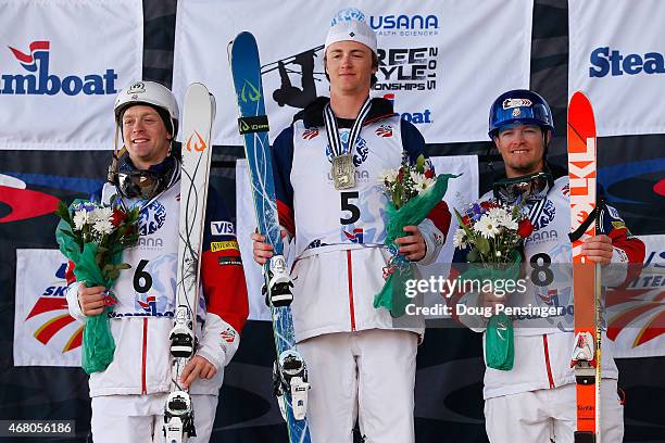 Bryon Wilson in second place, Thomas Rowley in first place and Joseph Discoe in third place take the podium for the men's dual moguls at the 2015...