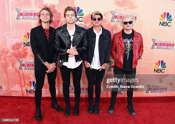 Musicians Ashton Irwin, Calum Hood, Luke Hemmings and Michael Clifford of 5 Seconds of Summer attend the 2015 iHeartRadio Music Awards which...