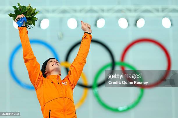 Gold medalist Irene Wust of the Netherlands celebrates on the podium during the flower ceremony for the Women's 3000m Speed Skating event during day...