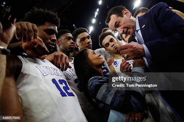 Head coach Mike Krzyzewski of the Duke Blue Devils speaks with TV personality Tracy Wolfson after defeating the Gonzaga Bulldogs 66-52 during the...