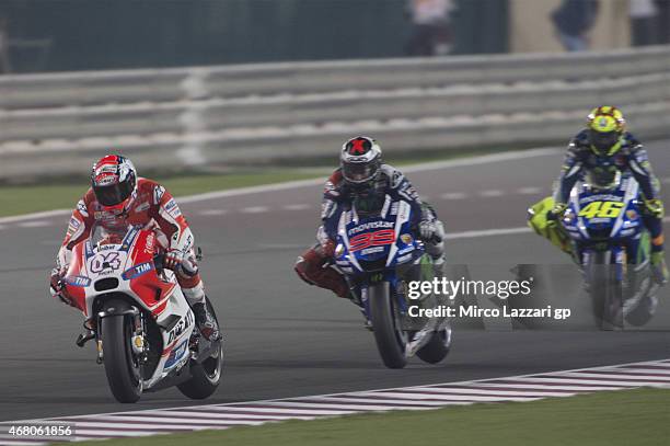 Andrea Dovizioso of Italy and Ducati Teamleads the field during the MotoGP race during the MotoGp of Qatar - Race at Losail Circuit on March 29, 2015...