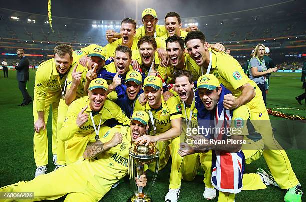 The Australian Team celebrate with the trophy after the 2015 ICC Cricket World Cup final match between Australia and New Zealand at Melbourne Cricket...