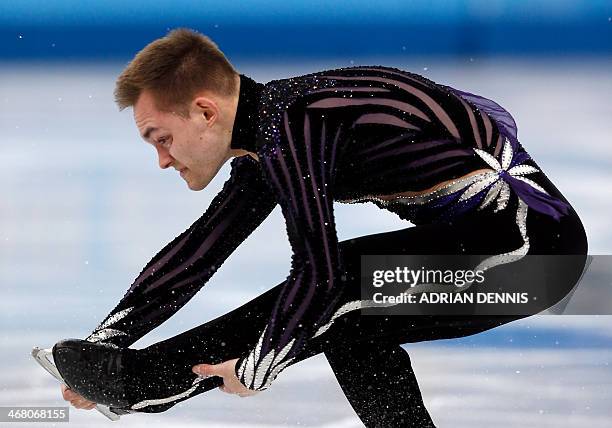 Italy's Paul Bonifacio Parkinson performs in the Men's Figure Skating Team Free Program at the Iceberg Skating Palace during the Sochi Winter...