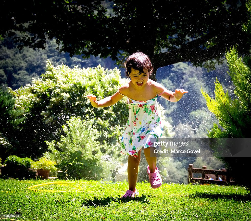 Girl with sprinkler