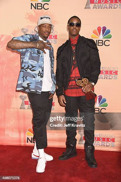 Hip-hop artist YG and record producer Jeremih pose in the press room during the 2015 iHeartRadio Music Awards which broadcasted live on NBC from The...