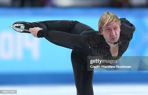 Evgeny Plyushchenko of Russia competes in the Men's Figure Skating Men's Free Skate during day two of the Sochi 2014 Winter Olympics at Iceberg...