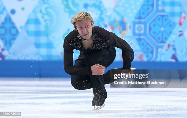 Evgeny Plyushchenko of Russia competes in the Men's Figure Skating Men's Free Skate during day two of the Sochi 2014 Winter Olympics at Iceberg...