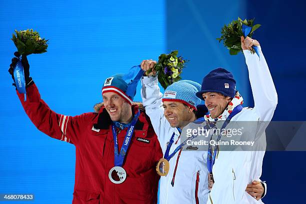 Silver medalist Dominik Landertinger of Austria, gold medalist Ole Einar Bjoerndalen of Norway and bronze medalist Jaroslav Soukup of the Czech...