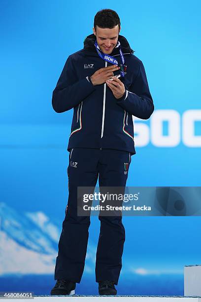 Silver medalist Christof Innerhofer of Austria celebrates during the medal ceremony for the Alpine Skiing Mens Downhill on day 2 of the Sochi 2014...