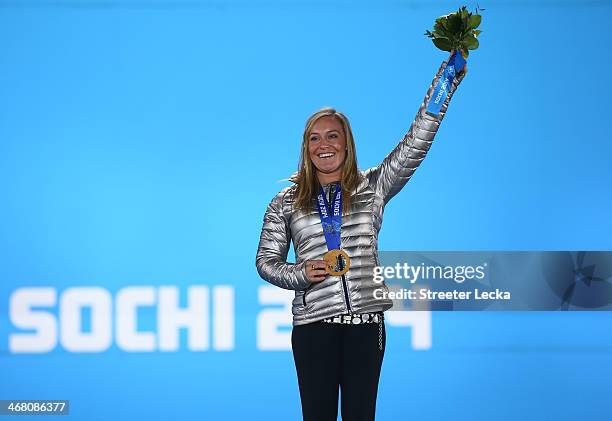 Gold medalist Jamie Anderson of the United States celebrates during the medal ceremony for the Women's Snowboard Slopestyle Finals on 2 of the Sochi...