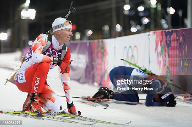 Magdalena Gwizdon of Poland and Ann Kristin Aafedt Flatland of Norway collapse at the finish line in the Women's 7.5 km Sprint during day two of the...