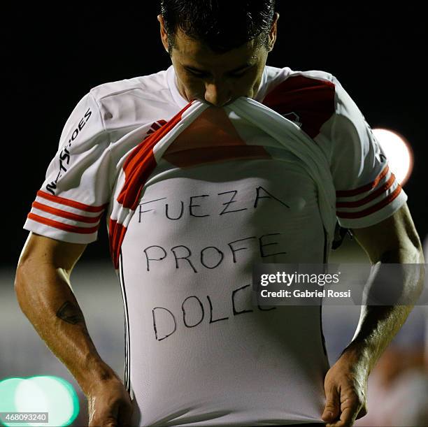 Rodrigo Mora of River Plate shows an inscription on his t-shirt to celebrate after scoring the third goal of his team during a match between Gimnasia...