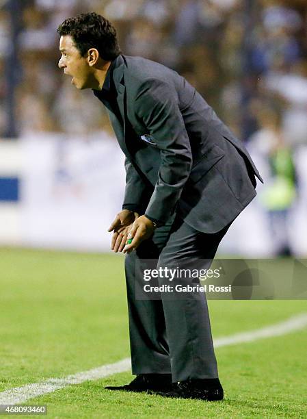 Marcelo Gallardo coach of River Plate gives instructions to his players during a match between Gimnasia y Esgrima La Plata and River Plate as part of...