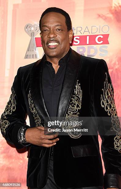 Musician Charlie Wilson poses in the press room during the 2015 iHeartRadio Music Awards which broadcasted live on NBC from The Shrine Auditorium on...