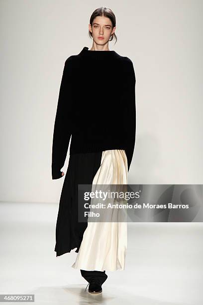 Model walks the runway at the Victoria Beckham presentation during Mercedes-Benz Fashion Week Fall 2014 at Cafe Rouge on February 9, 2014 in New York...