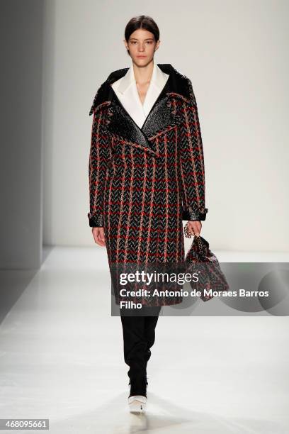 Model walks the runway at the Victoria Beckham presentation during Mercedes-Benz Fashion Week Fall 2014 at Cafe Rouge on February 9, 2014 in New York...