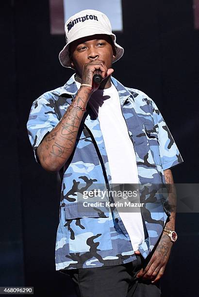 Recording artist YG accepts the Hip Hop/R&B Song of the Year award for "Don't Tell 'Em" onstage during the 2015 iHeartRadio Music Awards which...