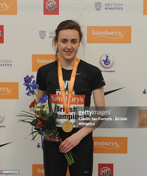 Laura Muir of Victoria Park Glasgow poses for a picture with her gold medal after winning the women's 800m at the Sainsbury's British Athletics...