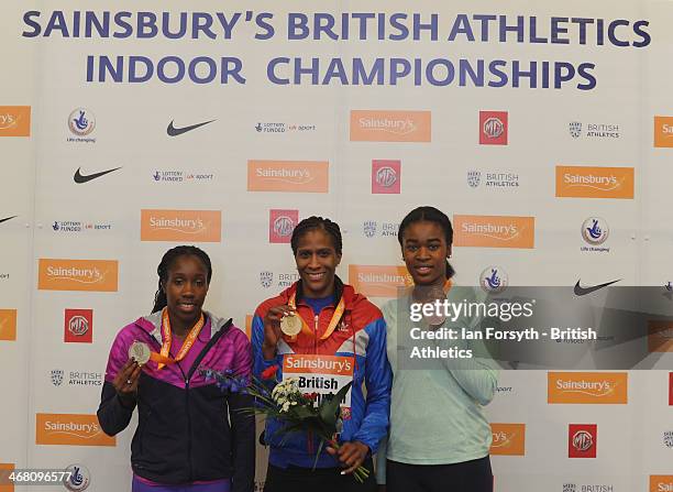 Gemma Bennett of Shaftesbury Barnet poses for a picture with her gold medal with Serita Solomon of Blackheath and Bromley who won silver and Marilyn...