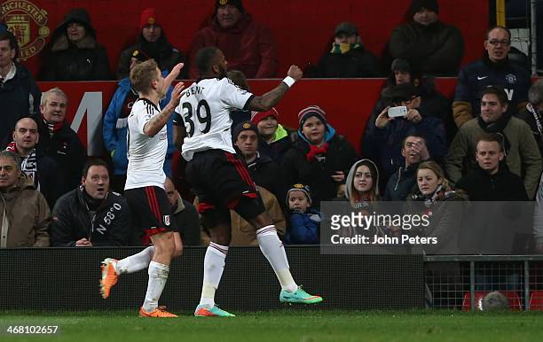 Darren Bent of Fulham celebrates scoring their second goal during the Barclays Premier League match between Manchester United and Fulham at Old...