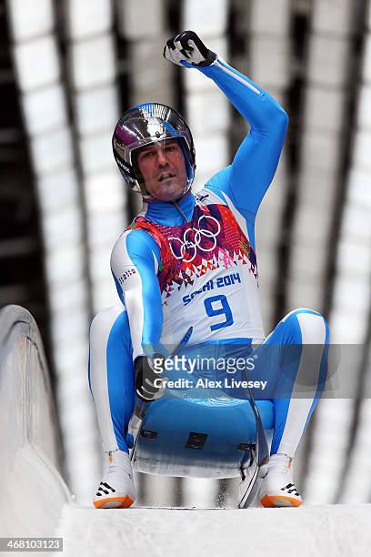 Armin Zoeggeler of Italy reacts after competing during the Men's Luge Singles on Day 2 of the Sochi 2014 Winter Olympics at Sliding Center Sanki on...