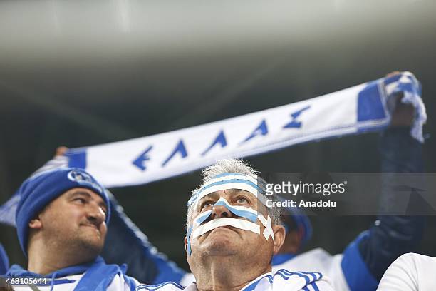 Greek supporters cheer their team during Hungary v Greece European Euro 2016 qualification soccer match at Grupama Arena in Budapest, March 29, 2015.