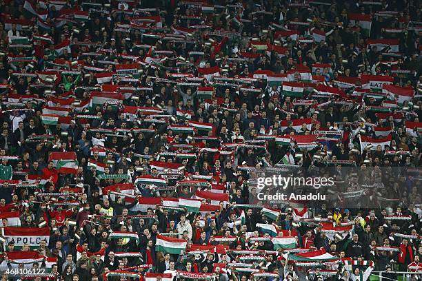 Hungarian supporters cheer their team during Hungary v Greece European Euro 2016 qualification soccer match at Grupama Arena in Budapest, March 29,...