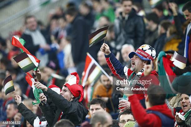 Hungarian supporters cheer their team during Hungary v Greece European Euro 2016 qualification soccer match at Grupama Arena in Budapest, March 29,...