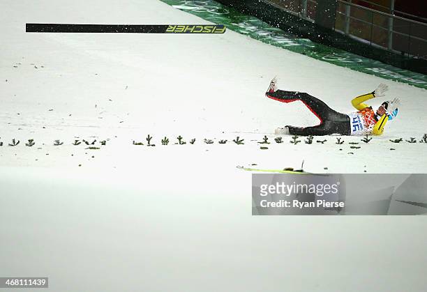 Severin Freund of Germany crashes during the Men's Normal Hill Individual Ski Jumping Final on day 2 of the Sochi 2014 Winter Olympics at RusSki...