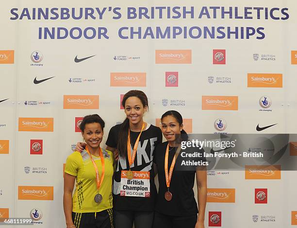 Katarina Johnson Thompson of Liverpool Harriers poses for a picture with her gold medal along with Jazmin Sawyers from City of Stoke who won silver...