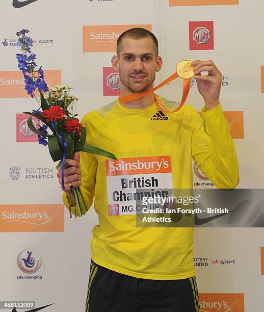 Robbie Grabarz of Newham poses for a picture with his gold medal after winning the men's high jump final at the Sainsbury's British Athletics Indoor...
