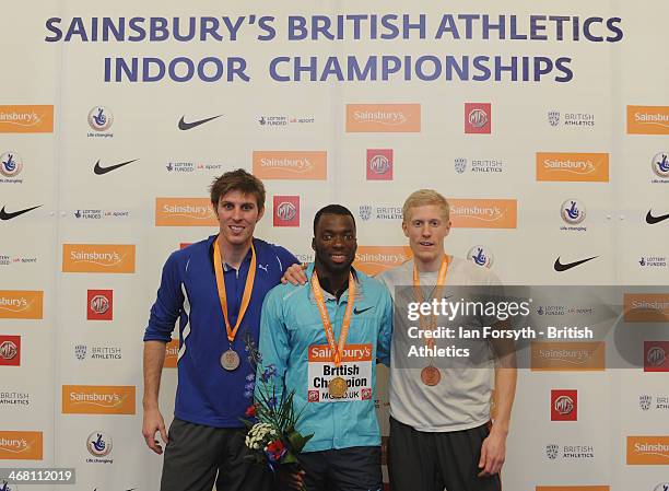 Nigel Levine of WSE Hounslow poses for a picture with his gold medal along with Richard Buck of City of York who won silver and Daniel Awde of...