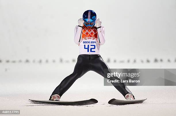 Thomas Diethart of Austria reacts after landing his jump in his Men's Normal Hill Individual Final on day 2 of the Sochi 2014 Winter Olympics at the...