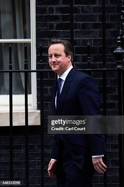 British Prime Minister David Cameron leaves Downing Street for Buckingham Palace on March 30, 2015 in London, England. Campaigning in what is...