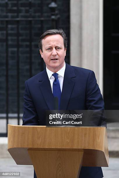 British Prime Minister David Cameron speaks in front of 10 Downing Street after meeting with Queen Elizabeth II on March 30, 2015 in London, England....