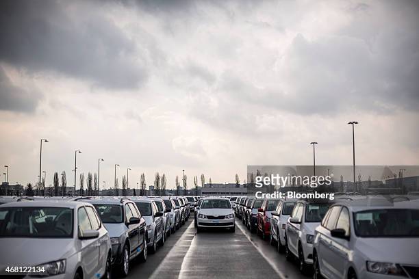 New Skoda automobiles stand in a parking lot ahead of distribution at Volkswagen AG's Skoda Auto AS manufacturing plant in Mlada Boleslav, Czech...