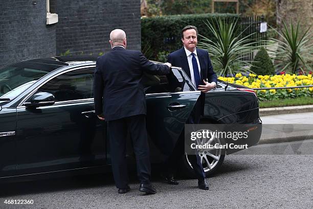 British Prime Minister David Cameron arrives to speak in front of 10 Downing Street after meeting with Queen Elizabeth II on March 30, 2015 in...