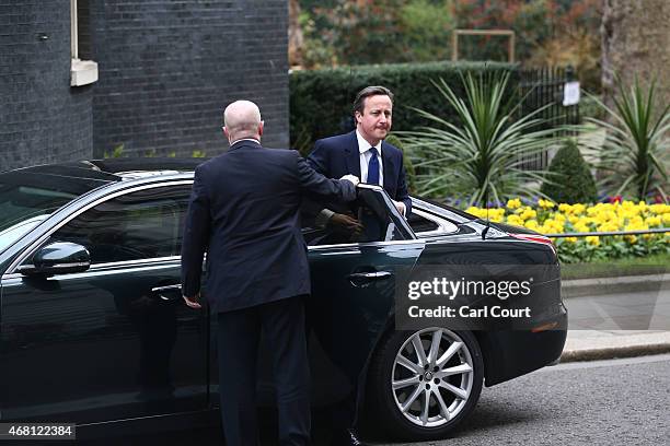 British Prime Minister David Cameron arrives to speak in front of 10 Downing Street after meeting with Queen Elizabeth II on March 30, 2015 in...