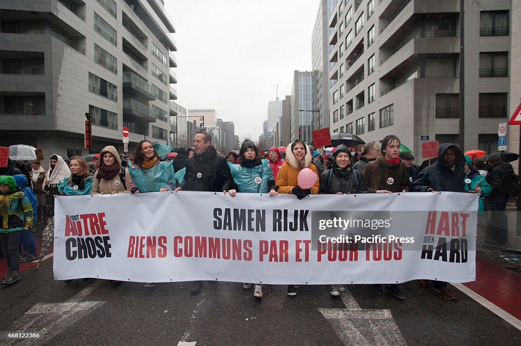 More than 20 000 people marched through the rain in Brussels...